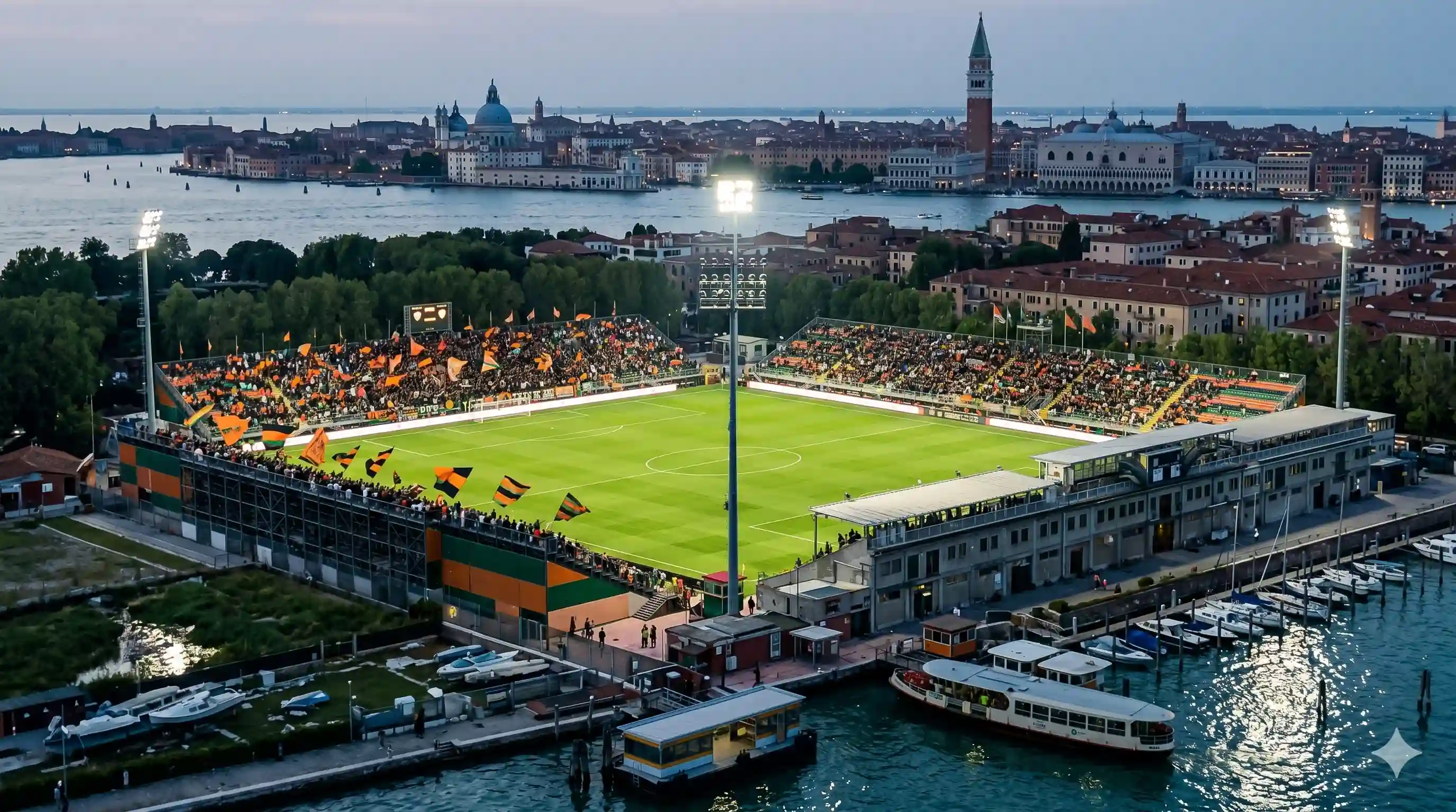 Venezia fans in orange and black at historic Pier Luigi Penzo night.